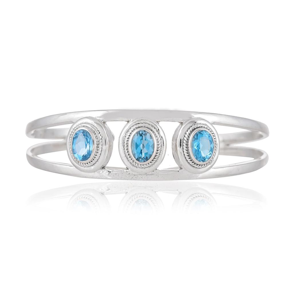 Blue Topaz Cuff Bracelet: Oval Gemstone, Sterling Silver
