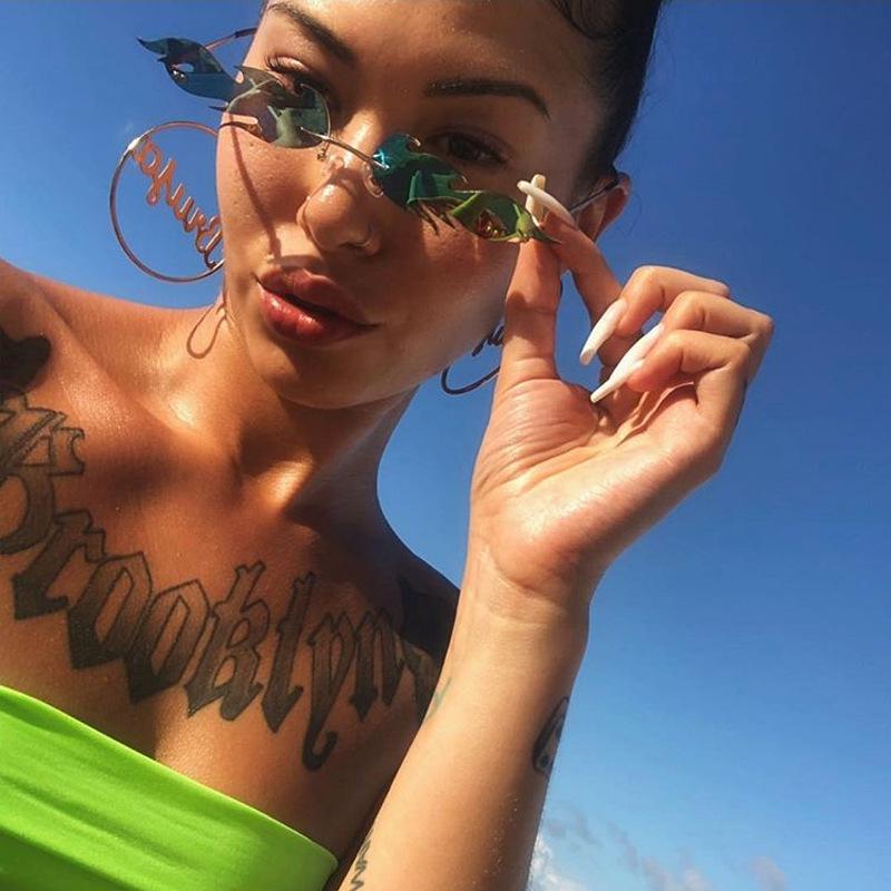 New fashion trend flame sunglasses men's and women's metal frameless street sunglasses European and American narrow-edge glasses S
