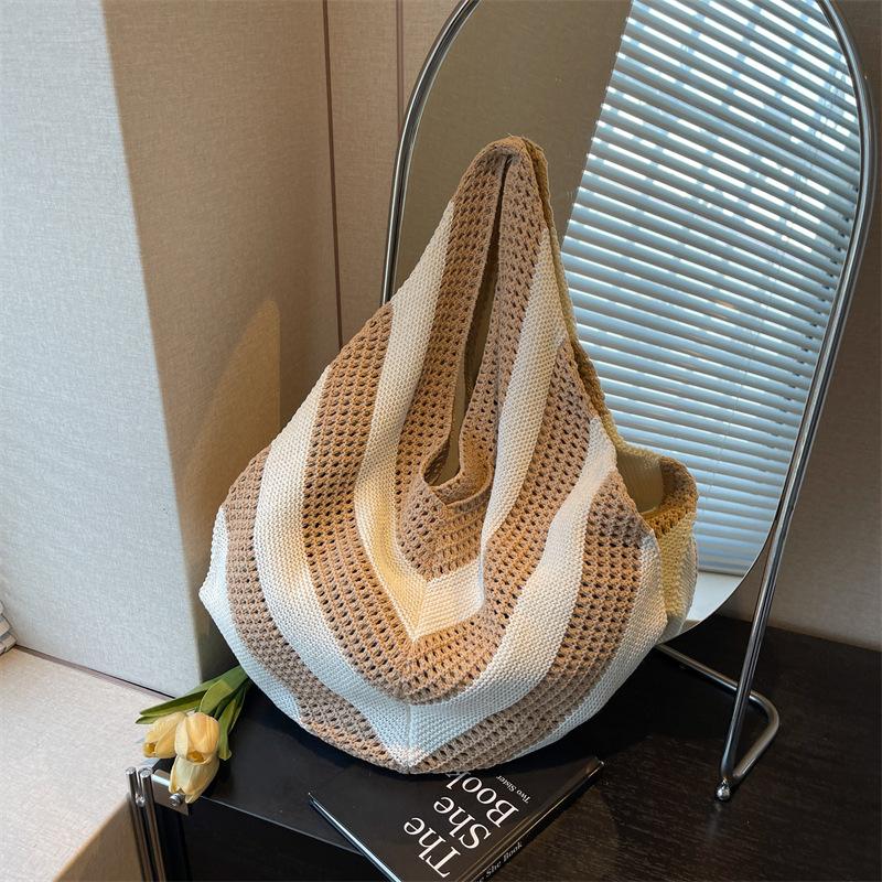 Niche woven lazy wind shoulder bag women's new holiday beach bag large-capacity commuter bag