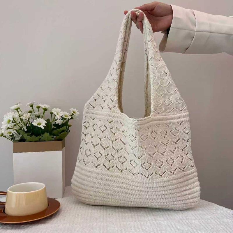 

New spring and summer hollow knitted handbag women s shoulder large-capacity tote bag lazy slack bag