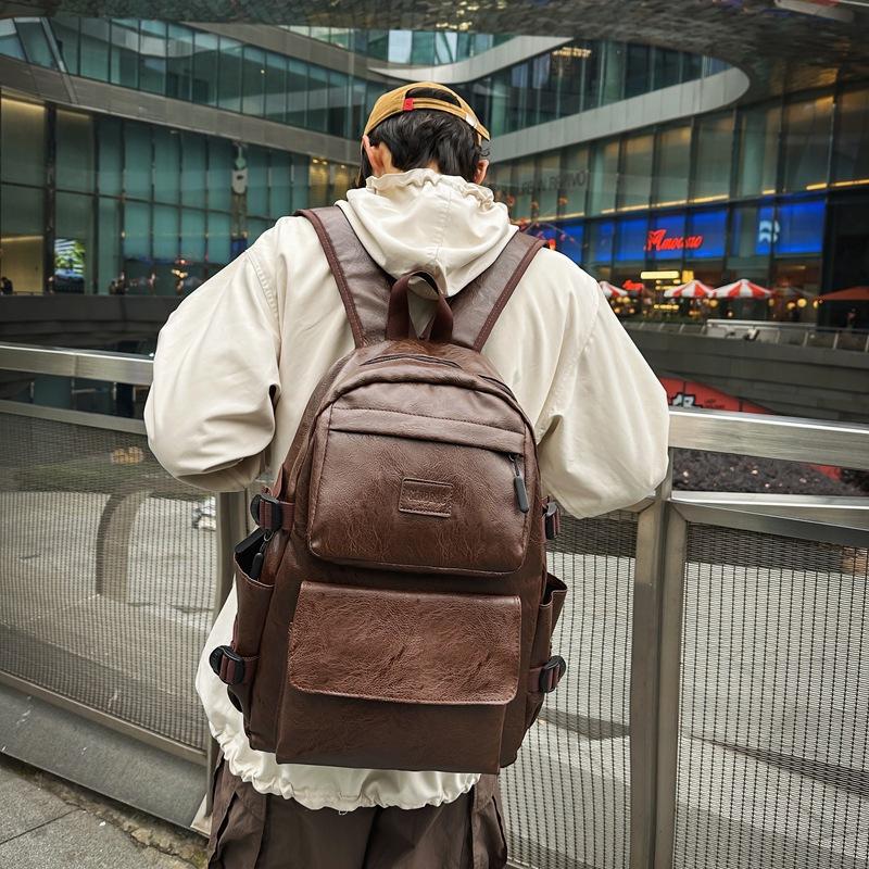 Korean version of PU men's backpack backpack travel bag student schoolbag computer men's bag tide