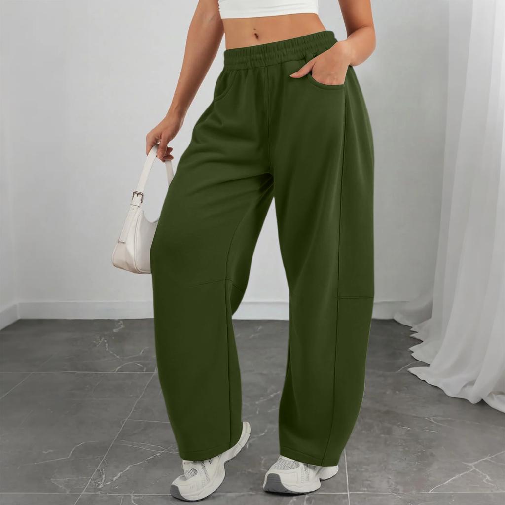 Moteable ensfargede avslappede treningsbukser med elastisk midje og lommer for kvinner
