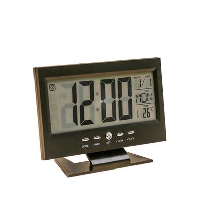 Sound Sensor Light Up LCD Digital Table Alarm Clock Calendar Temperature Display