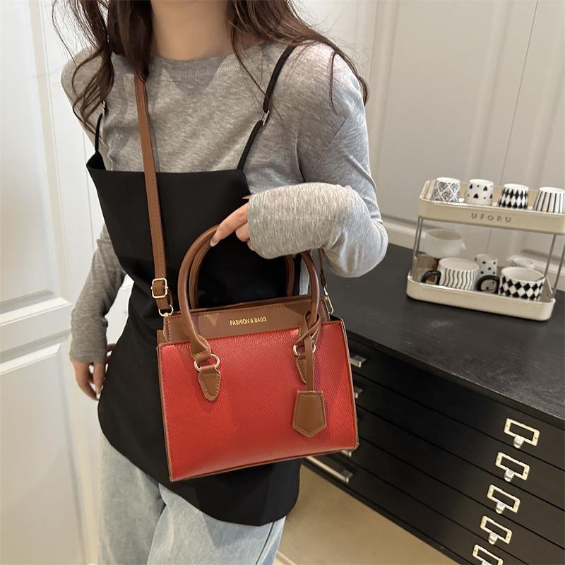 New beautiful contrasting color design sense niche atmosphere high texture women's handbag versatile shoulder messenger bag