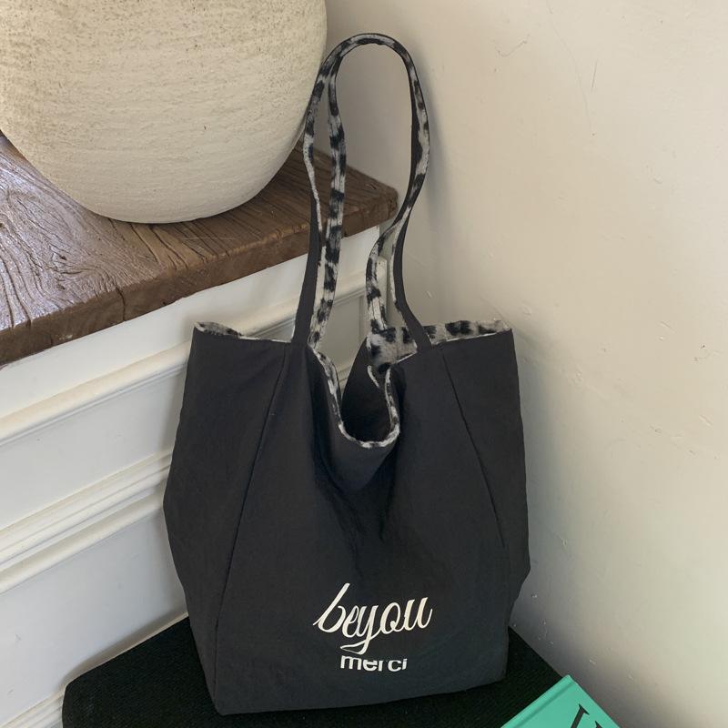 

Casual striped double-sided canvas bag women s autumn and winter lazy large-capacity shopping tote bag handbag shoulder bag чорний