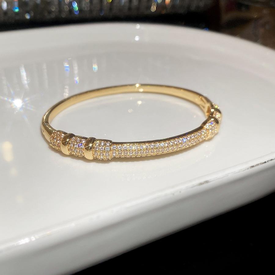 

18K Gold-Plated Zirconia Hollow Bracelet: French Retro Style, Trendy & Elegant Jewelry for Women