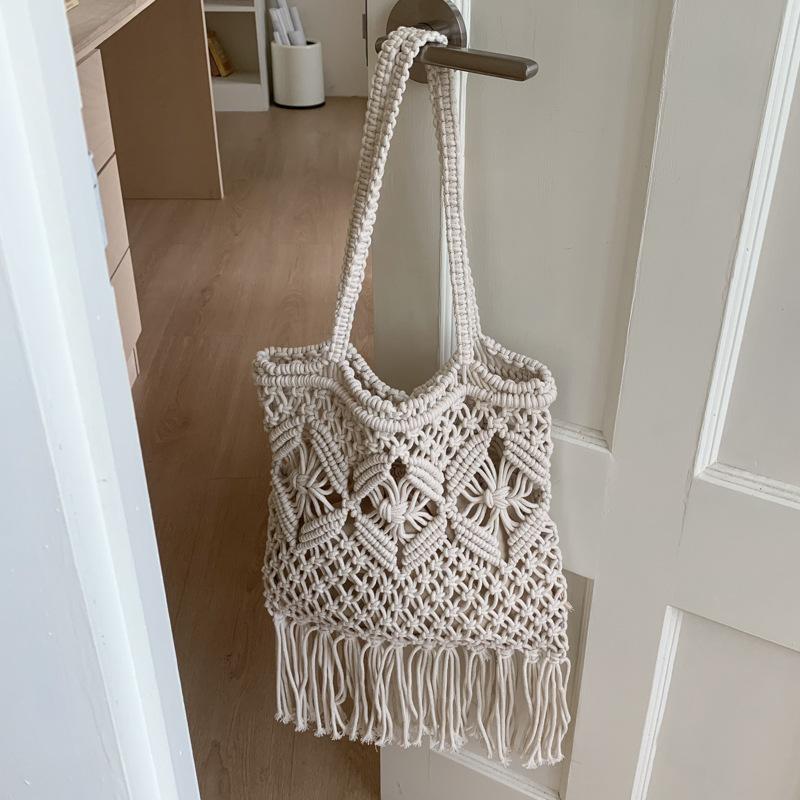 

2025 лето новая полая плетеная сумка приморский отдых портативная соломенная сумка большая вместимость плечевая подмышечная сумка-ведро 21*1*49