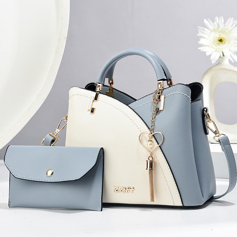 

Women s bag new contrasting color child and mother bag large capacity handbag fashionable shoulder bag Length 23 width 11 height 18cm синій
