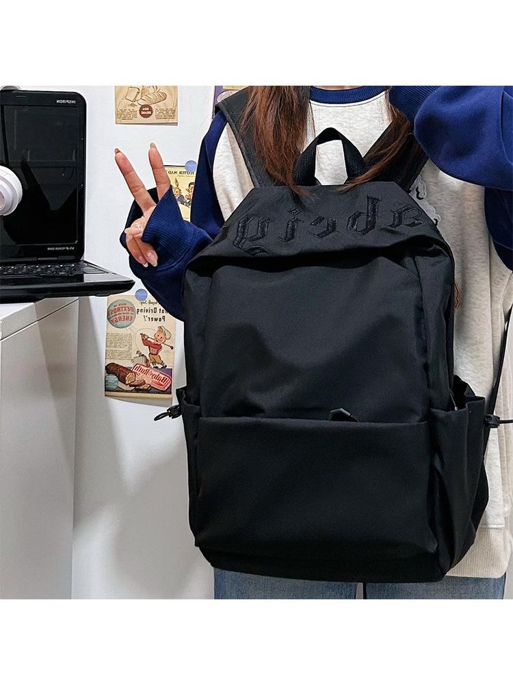 Schoolbag simple solid color middle and high school student schoolbag female 1011 new male large capacity backpack short trip backpack