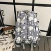 School bag large capacity multi-compartment tide cool junior high school students design sense versatile personality graffiti back