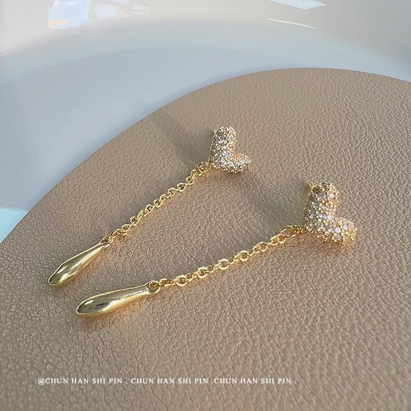 Love tassel mosquito coil plate earrings women's niche light luxury high-end earrings long earrings exquisite ear clips without ear piercings