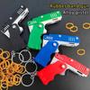Pistola Giocattolo a Elastico Metal Burst Mini Pistola Pieghevole in Lega Lanciatore Giocattolo con Portachiavi Elastici per Regali di Festa Compleanno