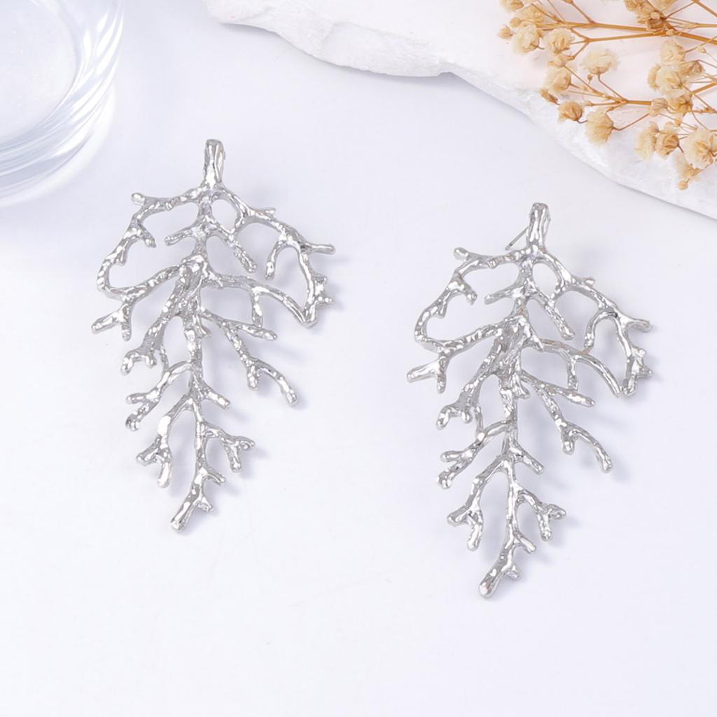 Personality trend cold wind temperament texture alloy coral stud earrings light luxury beach vacation wind women's earrings