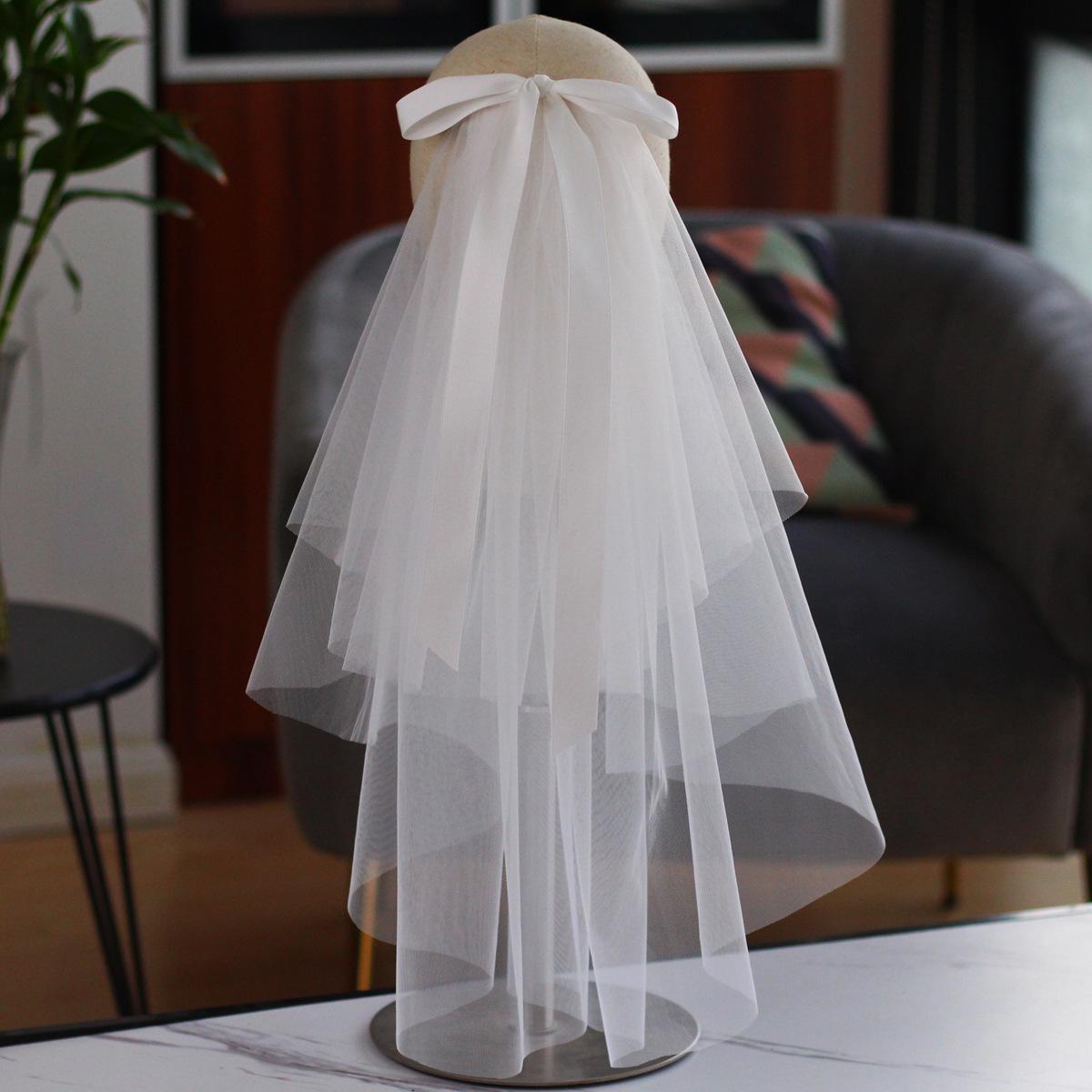 

Li Yitong Style Playful Double Layer Bow & Tulle Bridal Veil Under 60cm