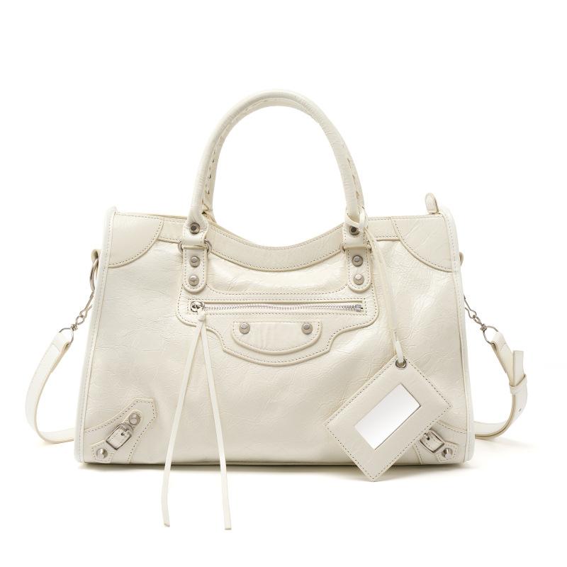 Spice girl rivet locomotive bag retro messenger leather large capacity tote bag niche leather handbag women