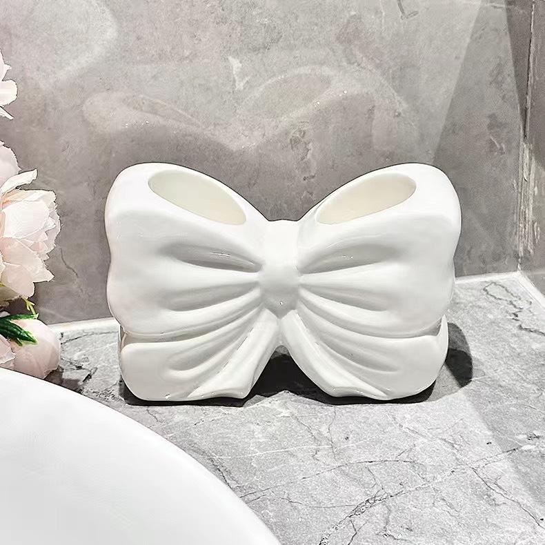 1pc Ceramic Bow Toothbrush Holder Ornament Ceramic Toothbrush Toothpaste Storage Rack Bathroom Accessories Brush Holder