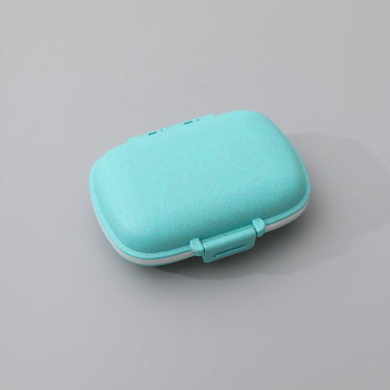 Moisture-proof 8-Compartment Pill Box: Portable Weekly Medicine Organizer.