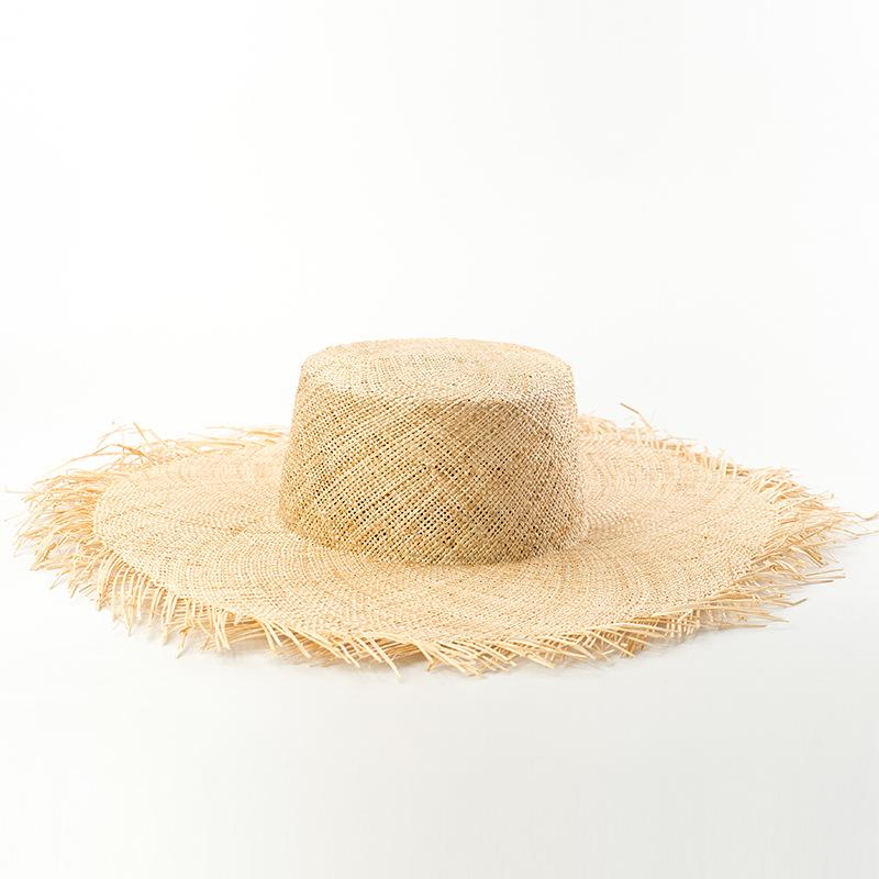 Summer new sun hat European and American simple treasure grass big burr edge beach hat spring and summer sun protection big eaves flat top straw hat