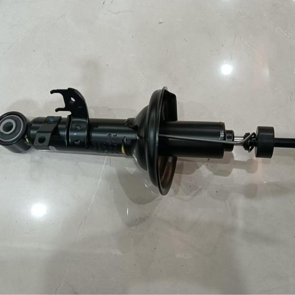 Nissan 48520-09R70 Front Left Shock Absorber Assembly