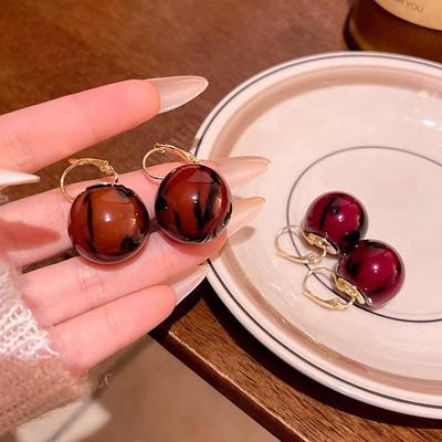 2024 Fall/Winter Leopard Print Light Luxury Resin Ball Earrings for Women - High-End, Niche Design, Internet Celebrity Favorites