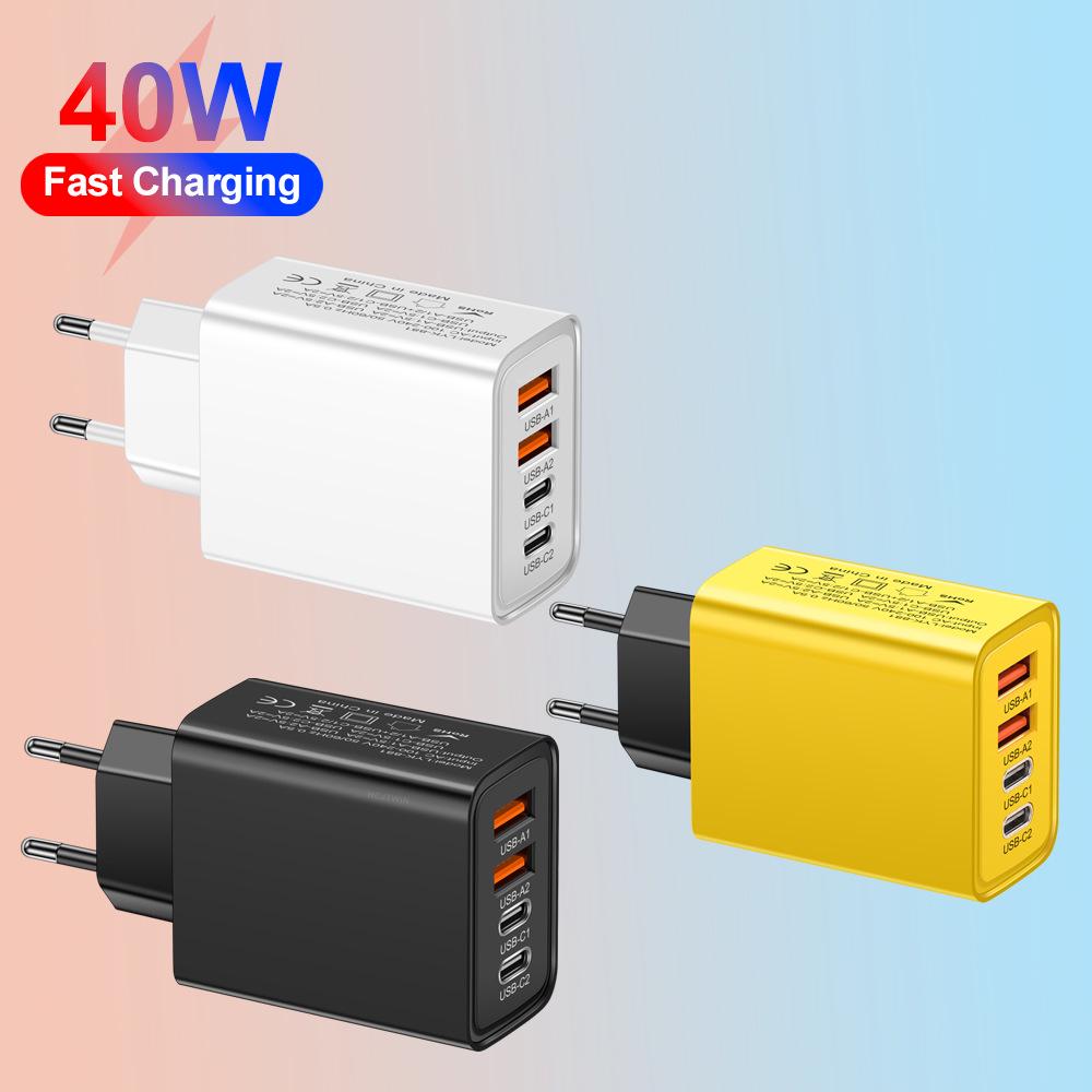 2.4A Multi-port Charger: Dual Type-C PD + Dual USB for Mobile Phones, Travel-Ready