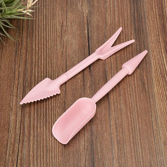 

Инструмент для пересадки рассады и пробивания лунок для посадки розовый