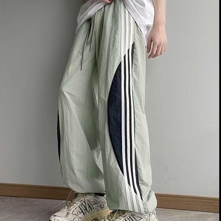 

Мужские быстросохнущие летние повседневные брюки-парашюты прямого кроя с цветными блоками и тремя полосками X-Large