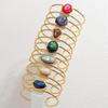 18K Gold-Inlaid Stainless Steel Hollow Line Bracelet with Stone - Elegant Fashion Jewelry for Women