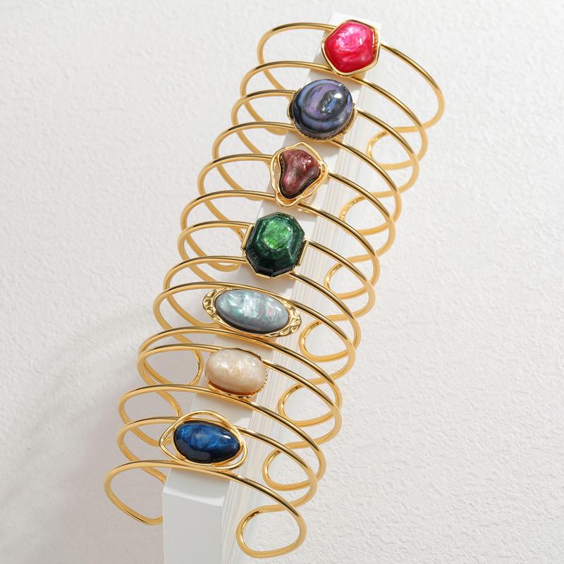 18K Gold-Inlaid Stainless Steel Hollow Line Bracelet with Stone - Elegant Fashion Jewelry for Women