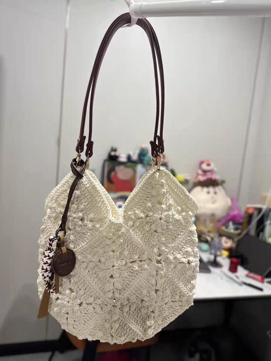 

Korean casual hand-woven bag women s 2025 new summer lazy wind large-capacity straw bag commuter armpit bag