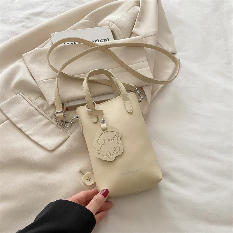 

Summer new solid color light and portable vertical storage mobile phone bag simple casual shoulder messenger bag белый