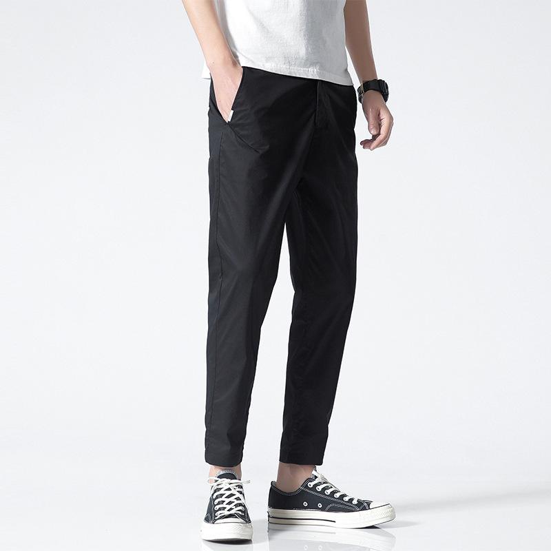 

Модні ультратонкі дев’ятихвилинні брюки з крижаного шовку. Вузькі повітропроникні прямі чоловічі повсякденні брюки. 38 чорний