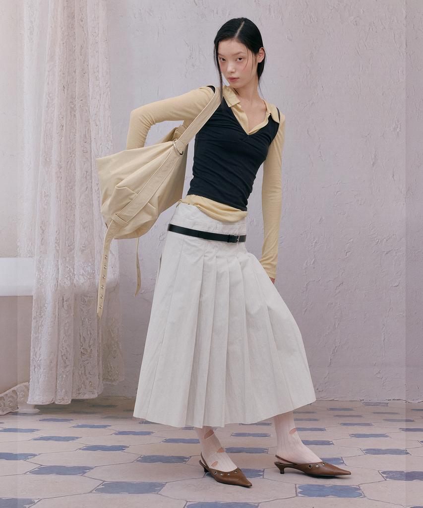Tinsi Low Cut Pleated Skirt