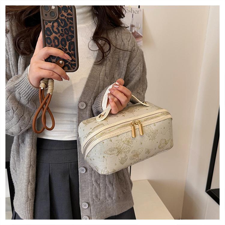 Elegant Vintage Embroidered Makeup Bag Large Capacity Portable and Perfect for Storing Cosmetics and Toiletries Ideal for Travel