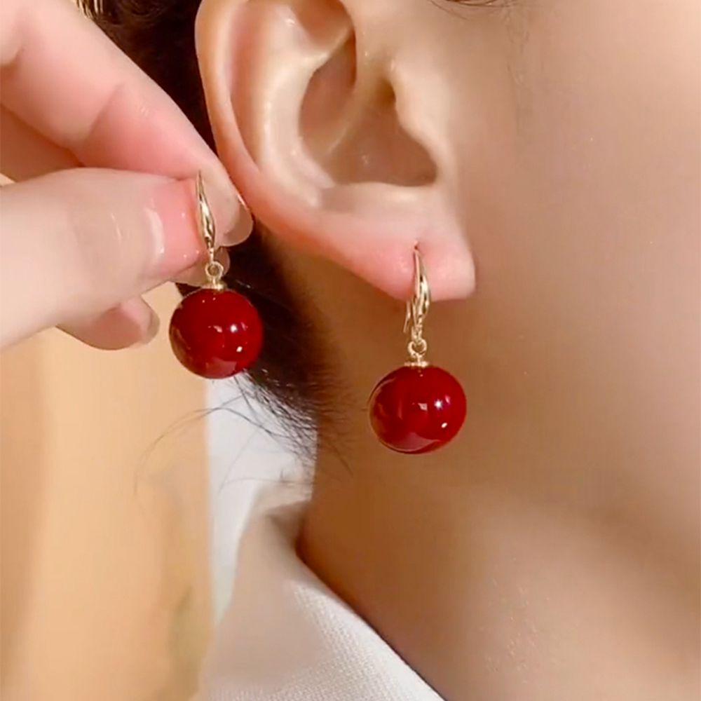 2024 French Minimalist Red Pearl Earrings: Elegant Retro High-End Ear Hooks for a Festive New Year