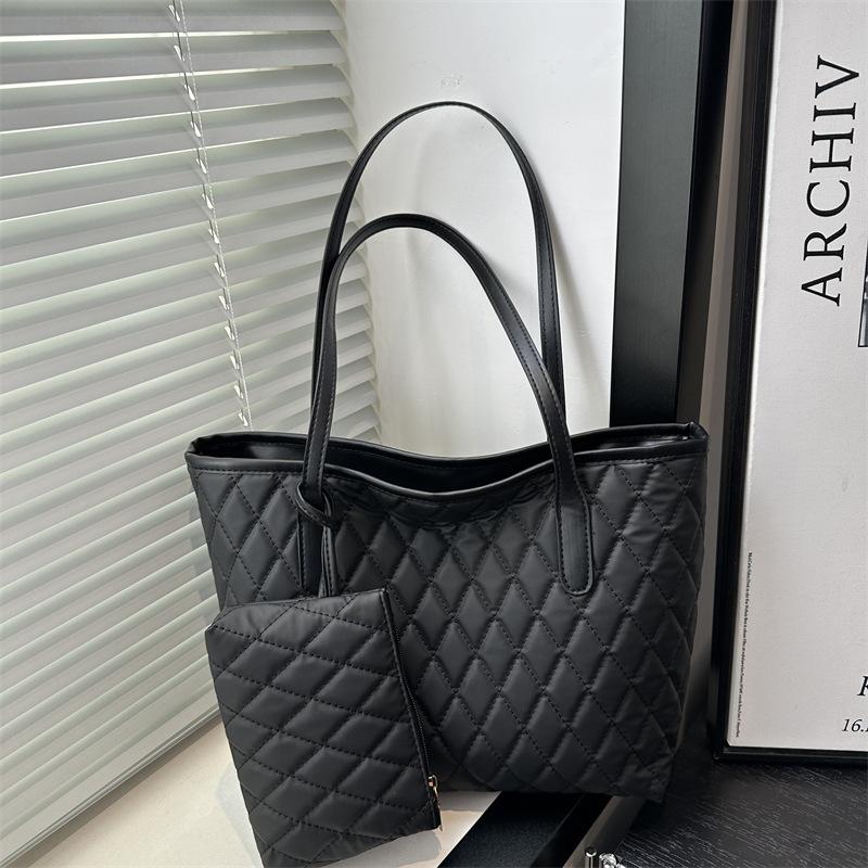 

2025 new casual simple shoulder armpit bag commuting large capacity foreign style rhombus embroidery thread women s bag large tote bag