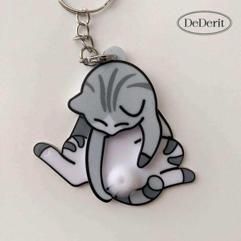 Cute Spinning Cat Keychain with Peanuts