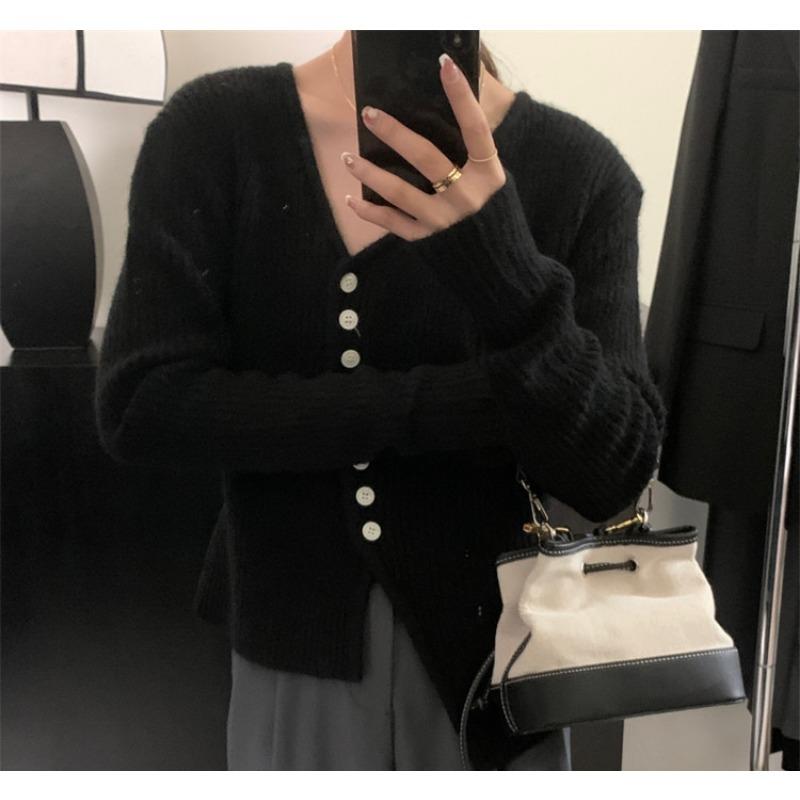 Autumn and winter new irregular single-breasted thin design loose V-neck long-sleeved knitted sweater with sweater women