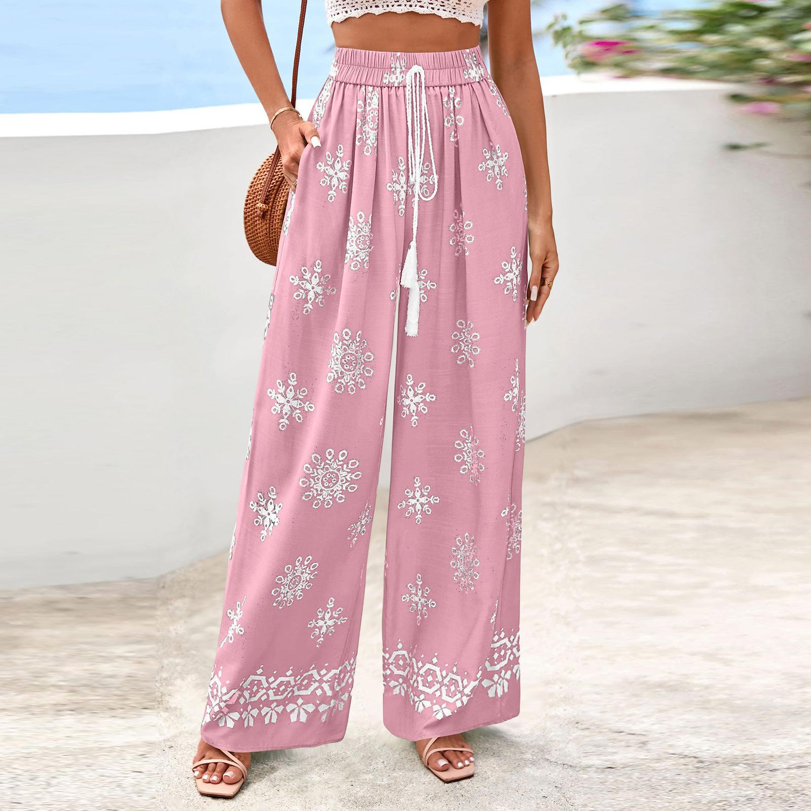 Женские широкие повседневные струящиеся брюки в цветочек M розовый