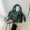 Portable locomotive bag New retro women's shoulder bag Fashion rivet fringed messenger bag