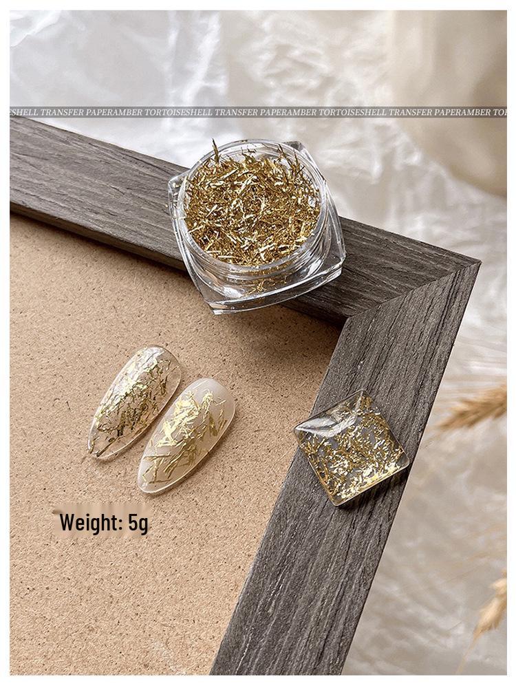 

Элегантный японский нейл-арт с золотой и серебряной фольгой - Деликатные шелковые нити для универсальных и модных ногтей.