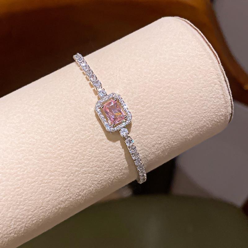 Pink Diamond Zirconia Starburst Flower Bracelet: Trendy, Luxurious Jewelry with Unique Design.