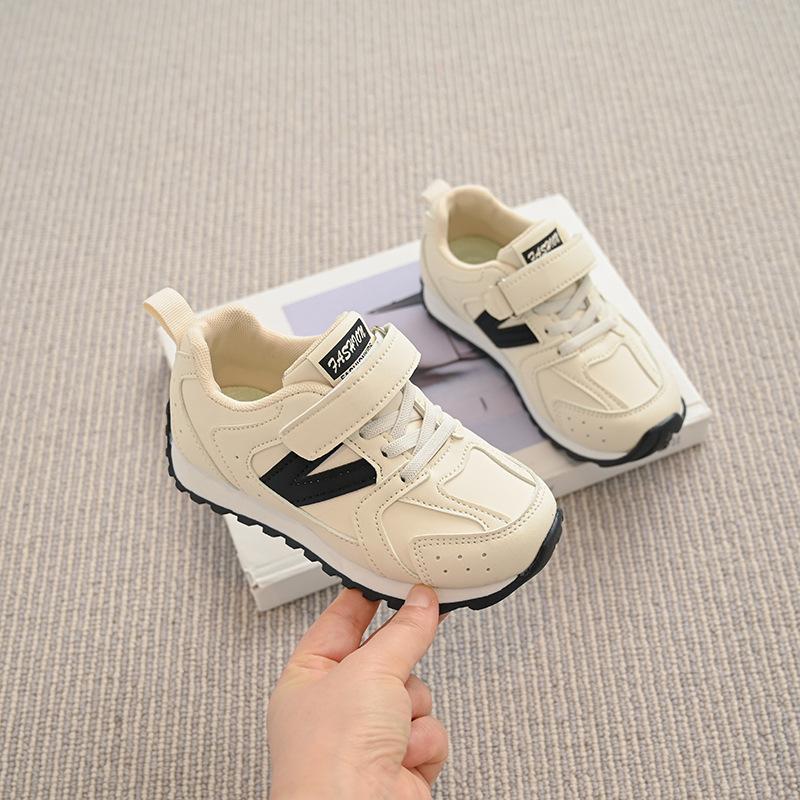 

Детская спортивная обувь Весна 2025 новая кожаная дышащая обувь для мальчиков мягкая подошва нескользящая обувь для девочек обувь Dexun Forrest Gump 26-30 yards FCL shot 50 pairs