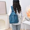 Compact Backpack with Adjustable Straps and Front Zipper Pocket