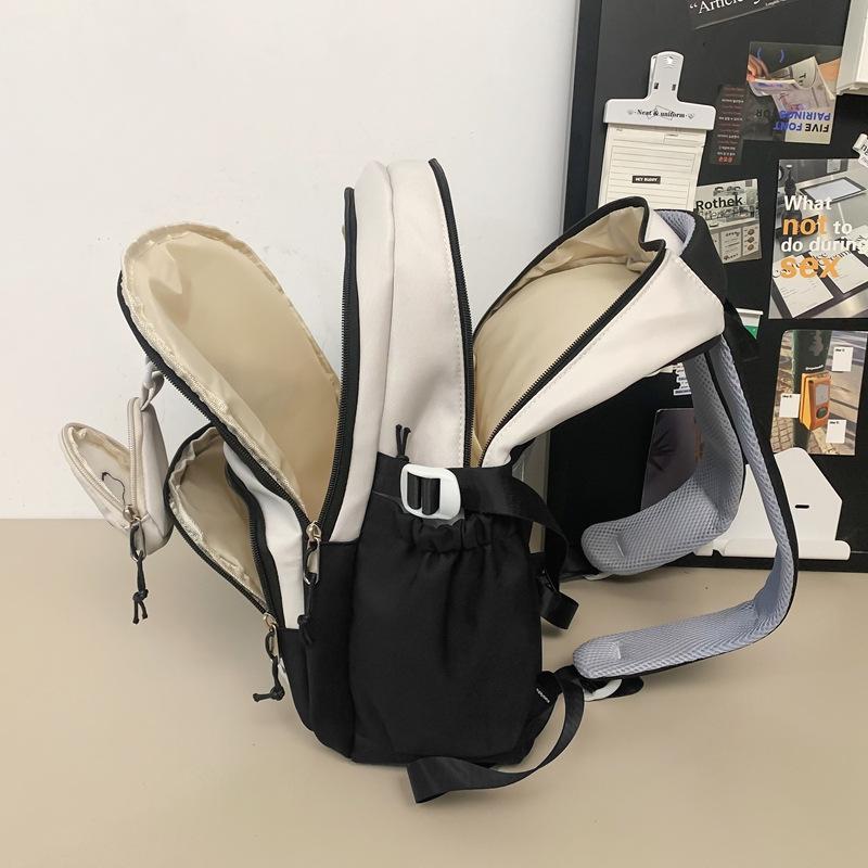 Schoolbag schoolbag female junior high school student college student backpack large capacity versatile contrasting splicing ins couple backpack
