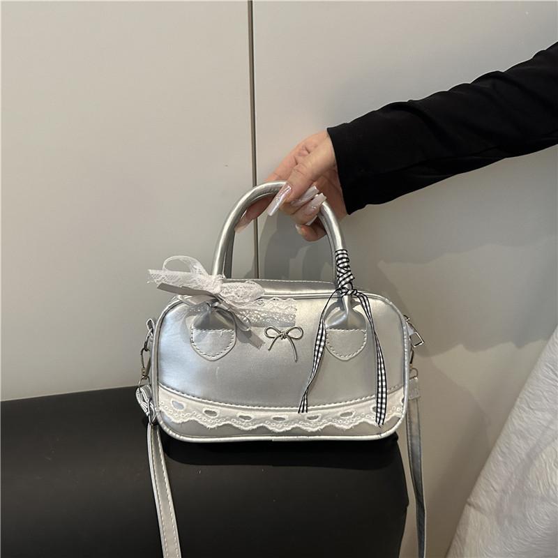 Trendy personality popular versatile shoulder bag women's foreign leisure high sense solid color ribbon temperament messenger bag