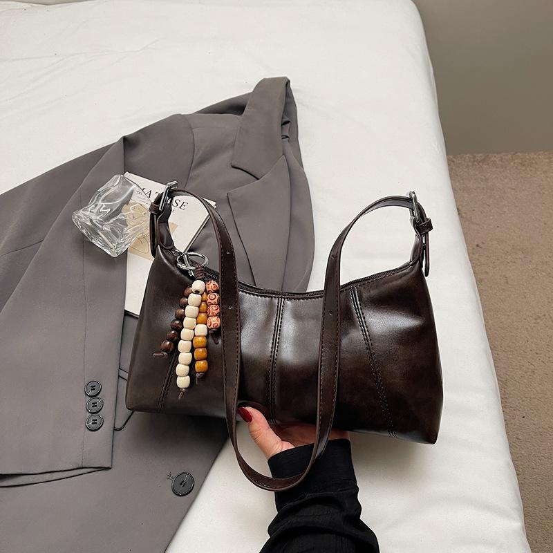 

Французский простой багет подмышечная сумка женская 2025 осень новая мода текстурированная женская сумка корейская наплечная сумка мессенджер