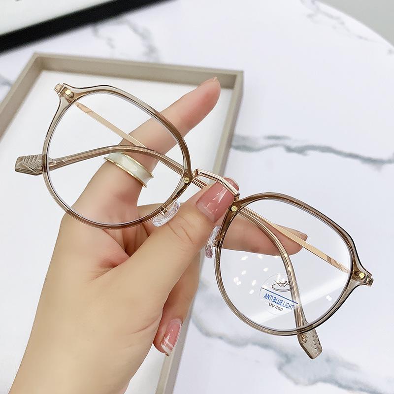 Unisex TR90 Metal Frame Blue Light Blocking Glasses - Retro, Versatile, Clear Lenses for Myopia Students.