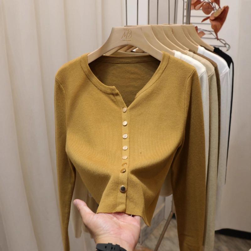 Gentle style solid color metal buckle simple short knitted long-sleeved cardigan v-neck sweater women's autumn and winter top