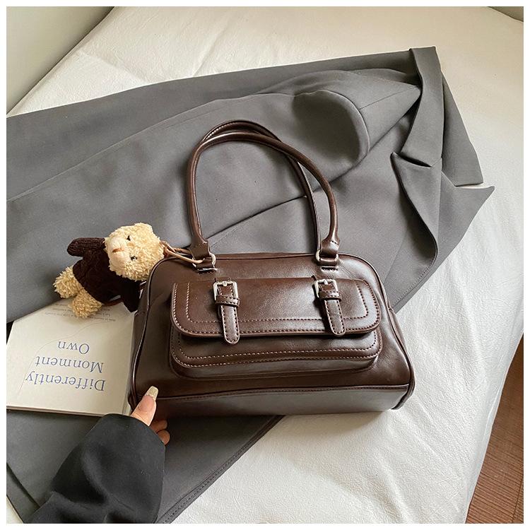 Eine modische, schlichte und elegante, Nischen-Casual-Einzelschultertasche für Damen, eine koreanische Version der beliebten Pillow Bag